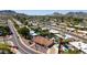 Stunning aerial view of a home nestled within a vibrant desert community with mountain views at 9234 N 33Rd Way, Phoenix, AZ 85028