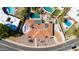 An aerial view shows the layout of a home with a tiled roof and inviting backyard pool and patio area at 9234 N 33Rd Way, Phoenix, AZ 85028