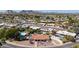 Beautiful aerial shot showcases a home with a tile roof in a lush desert community at 9234 N 33Rd Way, Phoenix, AZ 85028