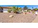 Home with desert landscaping, brick walkway, white stucco exterior and barrel tile roof at 9234 N 33Rd Way, Phoenix, AZ 85028