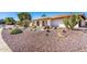 Single-story home with desert landscaping and barrel tile roof at 9234 N 33Rd Way, Phoenix, AZ 85028