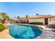 Inviting pool in a desert home backyard; multiple seating areas allow for easy entertaining at 9234 N 33Rd Way, Phoenix, AZ 85028