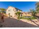 Expansive backyard with a covered patio, pergola, and lush lawn, ideal for outdoor entertaining and relaxation at 9413 W Pioneer St, Tolleson, AZ 85353