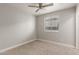 Bedroom featuring neutral carpet, paint, and ceiling fan at 9413 W Pioneer St, Tolleson, AZ 85353