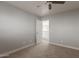 Bedroom with neutral carpet, paint, and ceiling fan at 9413 W Pioneer St, Tolleson, AZ 85353