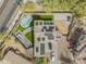 Aerial view showcasing a modern home with a sparkling pool and landscaped backyard at 1001 N 165Th Ave, Goodyear, AZ 85338