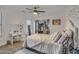 Bright bedroom with a decorative vanity and a view into the walk-in closet at 1001 N 165Th Ave, Goodyear, AZ 85338