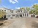 An inviting two-story home with solar panels and neutral stucco, blending elegance with sustainable energy at 1001 N 165Th Ave, Goodyear, AZ 85338