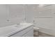 Bathroom featuring a single sink vanity, a toilet, and a bathtub with a shower at 12374 W Marguerite Ave, Avondale, AZ 85323