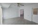 Bright living room features a neutral palette, tiled flooring, and ample natural light at 13816 N 103Rd Ave, Sun City, AZ 85351