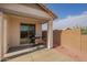 Patio with a grill and seating area in this backyard at 14377 W Alameda Rd, Surprise, AZ 85387