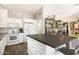 Well-lit kitchen with white cabinetry, modern appliances, and a center island, perfect for cooking and entertaining at 15377 W Cheery Lynn Rd, Goodyear, AZ 85395