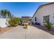 Backyard featuring a shaded pergola seating area and lush greenery, perfect for entertaining or relaxing at 16438 W Mescal St, Surprise, AZ 85388