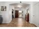 Inviting foyer featuring tile flooring, arched doorways and natural light at 16438 W Mescal St, Surprise, AZ 85388