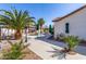 Inviting backyard pool with lush landscaping and a beautiful patio area for relaxing and entertaining at 16438 W Mescal St, Surprise, AZ 85388