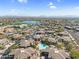 Aerial view showcasing the community, nearby lake, and desert landscape at 16800 E El Lago Blvd # 2072, Fountain Hills, AZ 85268