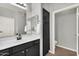 Bathroom featuring a single sink vanity with storage and a separate toilet room at 16800 E El Lago Blvd # 2072, Fountain Hills, AZ 85268