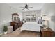 Bedroom with neutral decor, carpet, wood furniture, and natural light from the window at 16800 E El Lago Blvd # 2072, Fountain Hills, AZ 85268