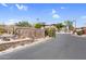 Welcoming entrance to this gated community showcases a stone monument and lush desert landscaping at 16800 E El Lago Blvd # 2072, Fountain Hills, AZ 85268