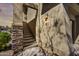 Close-up of a building's stairway entrance with stone accents and modern lighting at 16800 E El Lago Blvd # 2072, Fountain Hills, AZ 85268