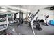 Bright community gym featuring modern equipment, mirrors, and mounted TV at 16800 E El Lago Blvd # 2072, Fountain Hills, AZ 85268