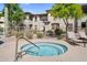 Relaxing hot tub area surrounded by lush greenery and lounge chairs for unwinding at 16800 E El Lago Blvd # 2072, Fountain Hills, AZ 85268