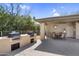 Outdoor kitchen and covered dining area, ideal for hosting summer barbecues and parties at 16800 E El Lago Blvd # 2072, Fountain Hills, AZ 85268