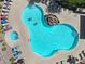 Overhead shot of community pool and hot tub with lounge chairs and desert landscaping at 16800 E El Lago Blvd # 2072, Fountain Hills, AZ 85268