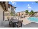 Outdoor dining and lounging areas adjacent to the pool, perfect for community gatherings at 16800 E El Lago Blvd # 2072, Fountain Hills, AZ 85268