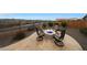 Charming backyard with fire pit, pavers, and mountain views at 19051 N 259Th Ave, Buckeye, AZ 85396