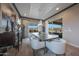 Elegant dining room with stylish chairs and a chandelier at 19051 N 259Th Ave, Buckeye, AZ 85396