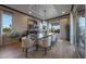 Elegant dining room with stylish chairs and a chandelier at 19051 N 259Th Ave, Buckeye, AZ 85396