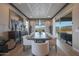 Elegant dining room with stylish chairs and a chandelier at 19051 N 259Th Ave, Buckeye, AZ 85396