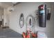 Garage with electric car charger, vacuum, and storage at 19051 N 259Th Ave, Buckeye, AZ 85396