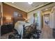 Well-decorated main bedroom featuring neutral colors, recessed lighting and doorway to bathroom at 19051 N 259Th Ave, Buckeye, AZ 85396