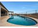 Sparkling pool with seating area, offering great outdoor living and beautiful scenery at 19051 N 259Th Ave, Buckeye, AZ 85396