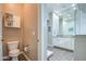 Powder room featuring tile flooring, standard toilet and pedestal sink at 19736 E Emperor Blvd, Queen Creek, AZ 85142