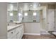 Bathroom featuring granite countertop, wood-look floors, and a frameless glass shower at 19736 E Emperor Blvd, Queen Creek, AZ 85142