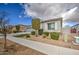 Single-story home featuring a landscaped yard and a neutral color scheme at 19736 E Emperor Blvd, Queen Creek, AZ 85142