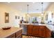 Well-lit kitchen featuring stainless steel appliances, ample counter space, and a functional layout at 203 S La Amador Trl, Casa Grande, AZ 85194