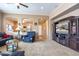 Spacious living room with plush carpet, recessed lighting, and archways to other living areas in the house at 203 S La Amador Trl, Casa Grande, AZ 85194