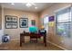 Office with neutral carpet, a ceiling fan, and natural light creates a perfect work environment at 203 S La Amador Trl, Casa Grande, AZ 85194