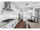 Well-equipped kitchen featuring stainless steel appliances, sleek countertops, and ample cabinet space at 20979 E Mayberry Rd, Queen Creek, AZ 85142