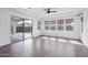 Sunlit room with large sliding doors and tile flooring at 20979 E Mayberry Rd, Queen Creek, AZ 85142