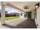 Covered patio with ample space for outdoor seating and entertaining with a backyard view at 20979 E Mayberry Rd, Queen Creek, AZ 85142