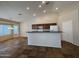 Eat-in kitchen featuring a breakfast bar, and ample counter space at 2146 E Aloe Pl, Chandler, AZ 85286