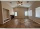 Bright living room with a stone fireplace, vaulted ceilings and plenty of natural light at 2146 E Aloe Pl, Chandler, AZ 85286