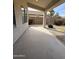 Covered patio with concrete flooring and desert landscaping provides shade and privacy at 2146 E Aloe Pl, Chandler, AZ 85286