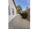 Desert landscaping lines the perimeter of the home offering low maintenance and drought tolerance at 2146 E Aloe Pl, Chandler, AZ 85286