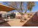 Relaxing backyard with gravel, BBQ, patio and covered area at 2177 S Weaver Dr, Apache Junction, AZ 85120